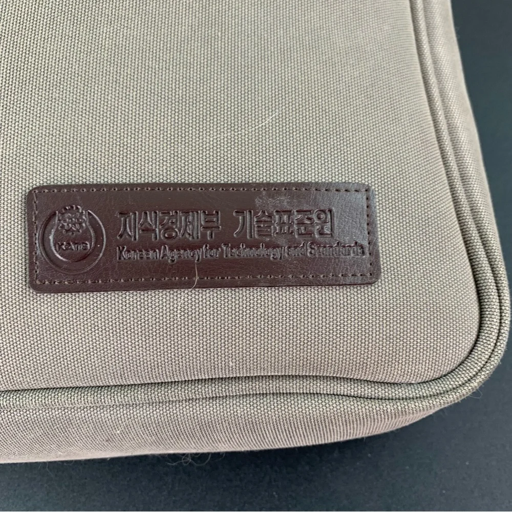 Golden Bell Tan and Brown Durable laptop bag with faux Leather Handle.